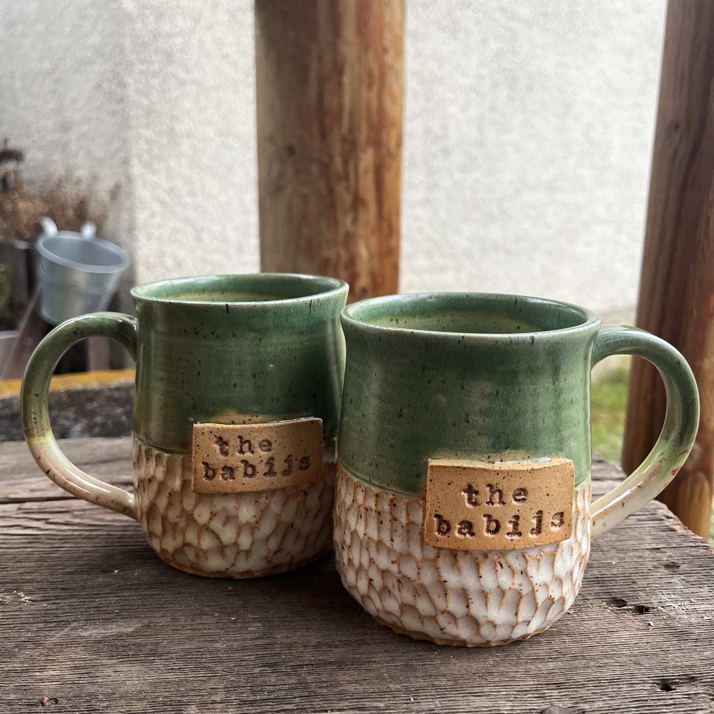 A matched pair of wedding mugs